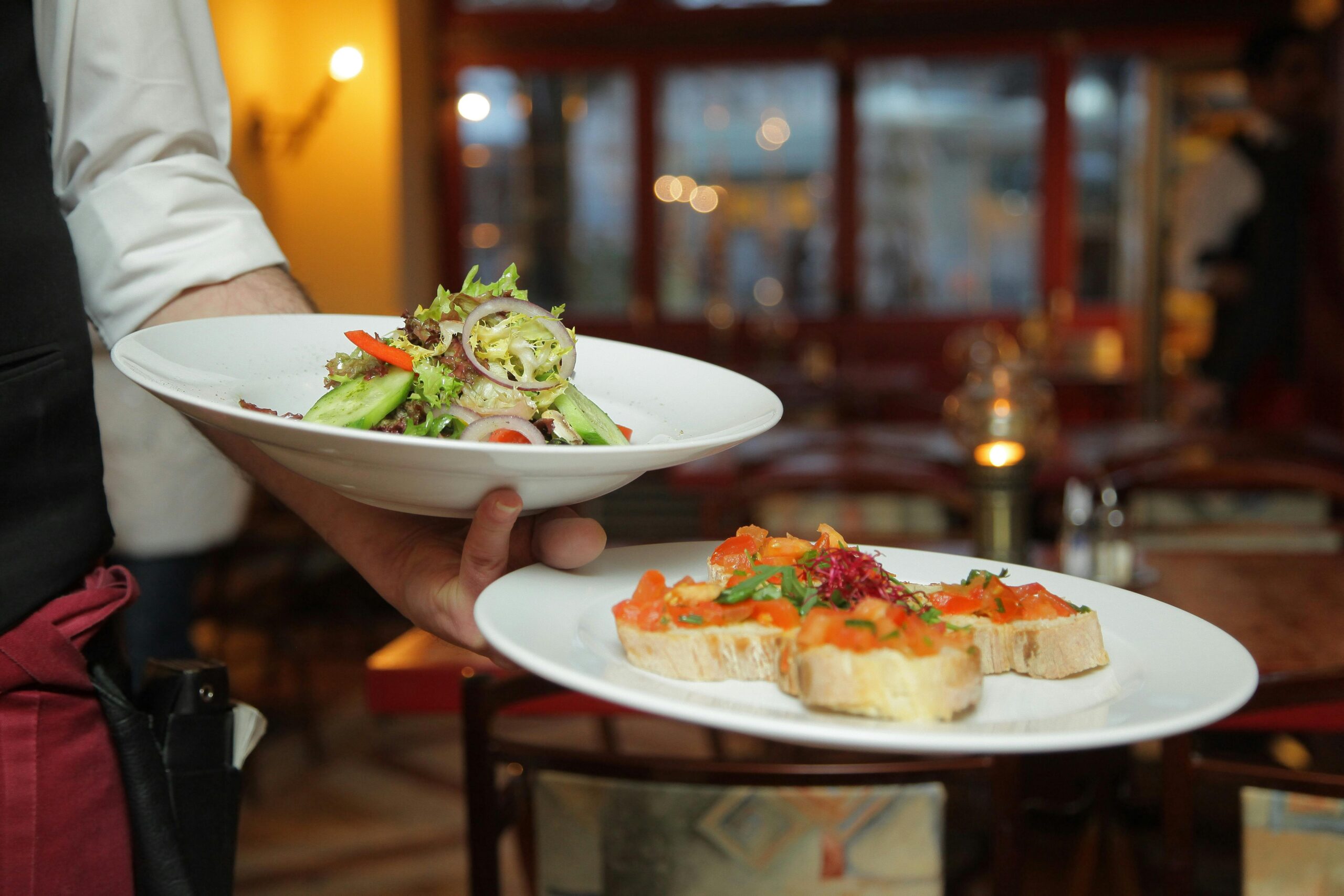 Vibrant restaurant scene with university students connecting over food