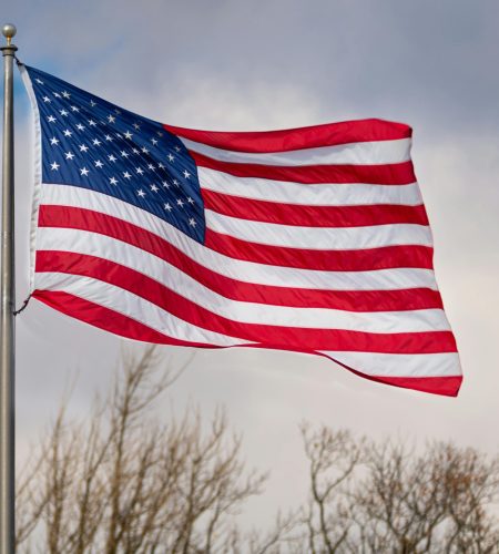 An American flag waves against a cloudy sky in Canonsburg, Pennsylvania.
